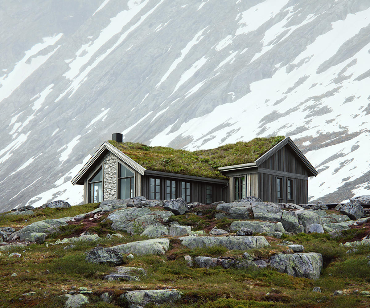 En hytte med gress på taket ligger ved foten av et snødekt fjell